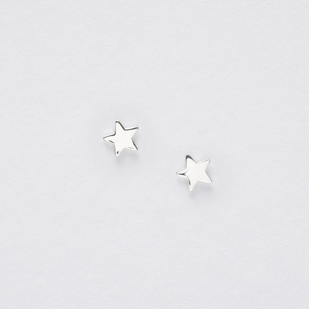 Silver Star Earrings On Greeting Card