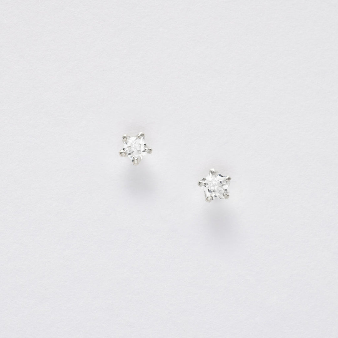 Silver Star Earrings On Greeting Card