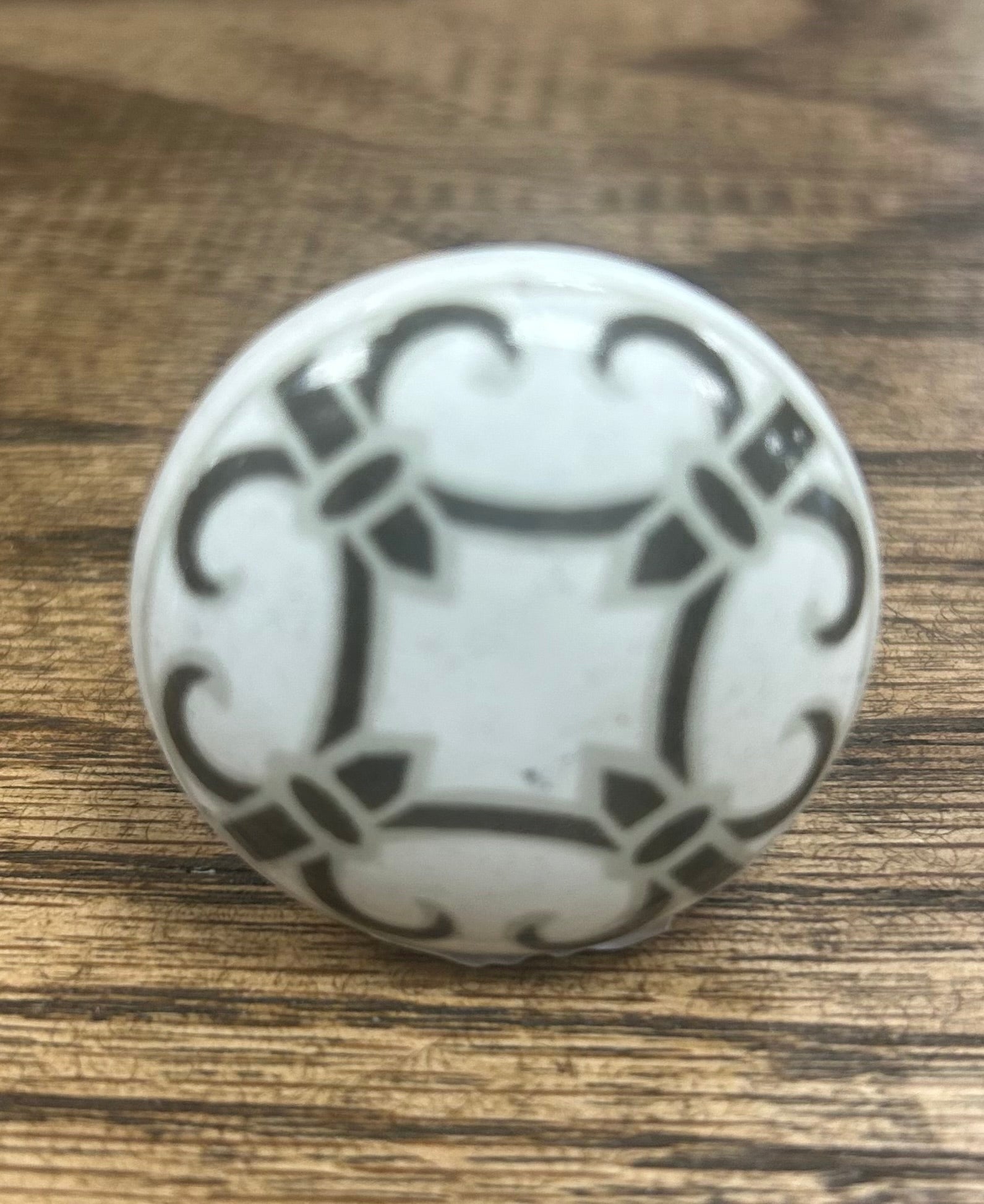 White with Black Design Flat Knob